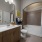 a bathroom with a shower sink and toilet