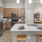 Luxury kitchen with at brown cabinets Elan City Center apartments in downtown Raleigh.